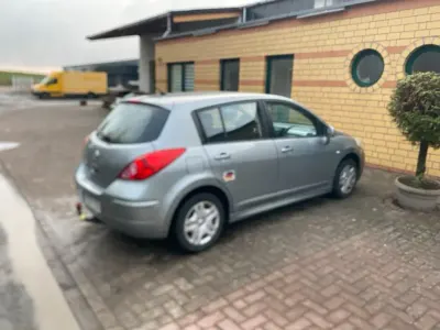 Gebraucht Nissan Tiida 110 PS (80 kW) 2011 Grau Kleinwagen