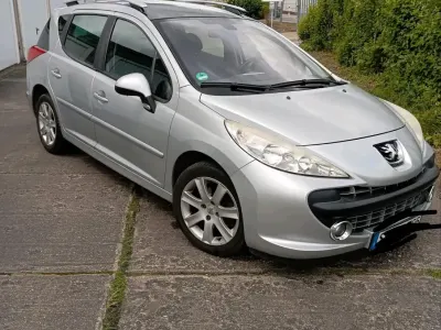 Gebraucht Peugeot 207 Premium 88 PS (64 kW) 2009 Silber Kombi