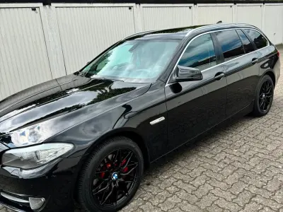 Gebraucht BMW 520 184 PS (135 kW) 2011 Schwarz Kombi
