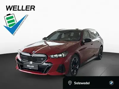 Gebraucht BMW i5 M Sport 442 kW (601 PS) 2025 Dragon fire rot (rot) Kombi