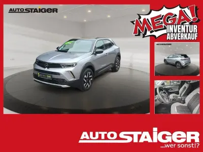 Gebraucht Opel Mokka Elegance 131 PS (96 kW) 2022 Tiefquarz grau/quarz silber SUV