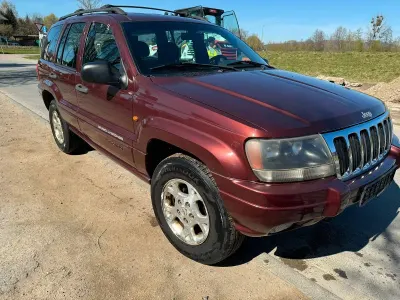 Käytetty Jeep Grand Cherokee Laredo 190 HP (139 kW) 2000 Punainen Katumaasturi