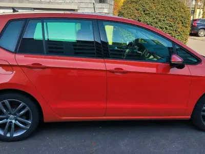 Używany VW Golf Sportsvan 150 KM (110 kW) 2015 Pomarańczowy Minivan