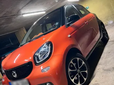 Używany Smart ForFour Passion 90 KM (66 kW) 2015 Pomarańczowy Hatchback