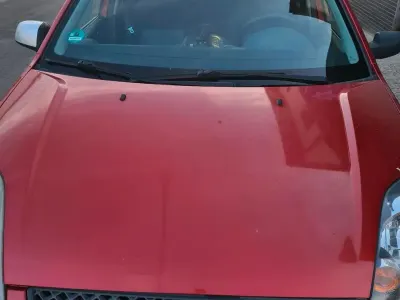 Gebraucht Ford Fiesta 65 PS (47 kW) 2006 Rot Kleinwagen