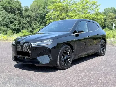 Gebraucht BMW iX Sport Line 455 kW (619 PS) 2023 Black sapphire SUV