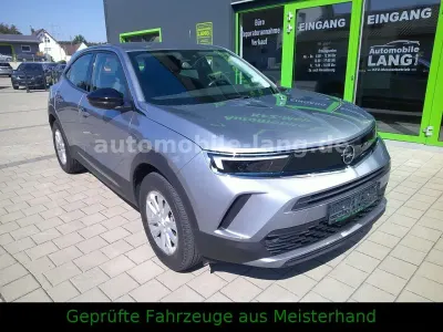 Gebraucht Opel Mokka-e 100 kW (136 PS) 2023 Quartz/artense grey SUV