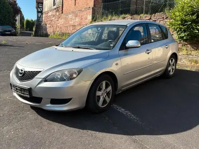 Używany Mazda 3 105 KM (77 kW) 2005 Srebrny Kombi