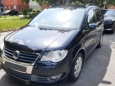 Gebraucht VW Touran 105 PS (77 kW) 2009 Schwarz Van / Kleinbus