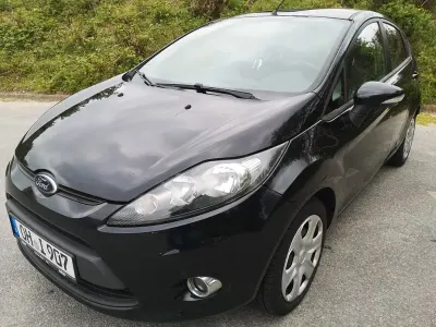 Gebraucht Ford Fiesta Trend 60 PS (44 kW) 2012 Schwarz Limousine