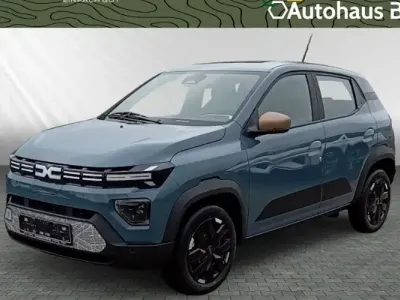 Gebraucht Dacia Spring Extreme 75 kW (102 PS) 2024 Safaribeige Kleinwagen