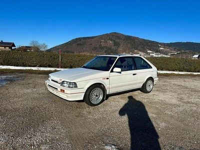 Second-hand Mazda 323 Inclusive 86 CP (63 kW) 1988 Alb Hatchback