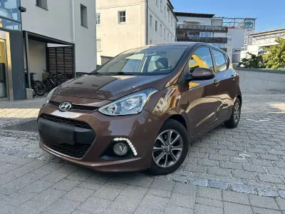 Gebraucht Hyundai i10 Edition 87 PS (63 kW) 2014 Braun Kleinwagen
