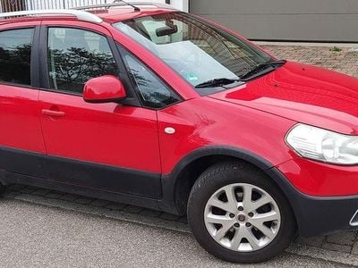 Second-hand Fiat Sedici Emotion 120 CP (88 kW) 2011 Roșu SUV