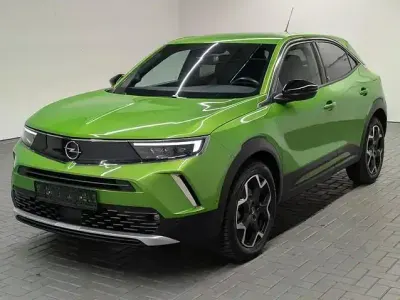 Gebraucht Opel Mokka-e Ultimate 100 kW (136 PS) 2021 Matcha green met. SUV