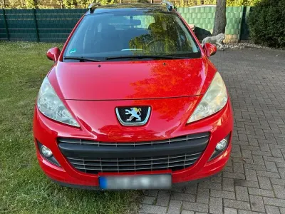 Gebraucht Peugeot 207 73 PS (53 kW) 2012 Rot Kombi