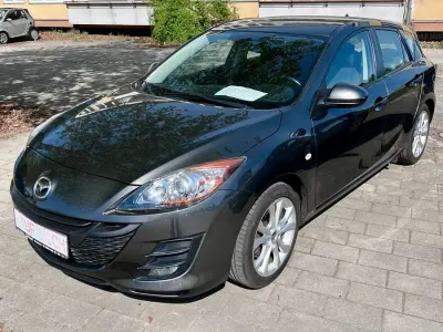 Używany Mazda 3 Active Plus 105 KM (77 kW) 2011 Szary Sedan/Limuzyna