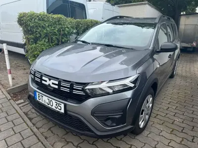 Gebraucht Dacia Jogger Essentiel 91 PS (66 kW) 2024 Grau Van / Kleinbus