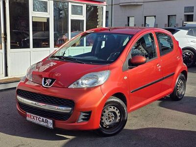 Gebraucht Peugeot 107 Filou 68 PS (50 kW) 2009 Lackierung orange mandaline/me Kleinwagen
