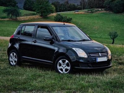 Second-hand Suzuki Swift Comfort 92 CP (67 kW) 2009 Negru Hatchback