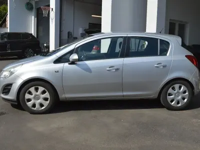 Używany Opel Corsa Edition 95 KM (69 kW) 2013 Srebrny Hatchback