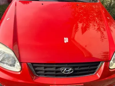 Gebraucht Hyundai Accent GLS 84 PS (61 kW) 2003 Rot Limousine