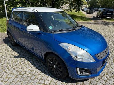 Second-hand Suzuki Swift 94 CP (69 kW) 2014 Albastru Hatchback