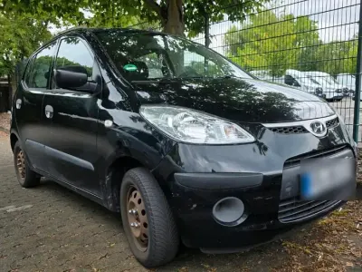 Gebraucht Hyundai i10 67 PS (49 kW) 2010 Schwarz Kleinwagen