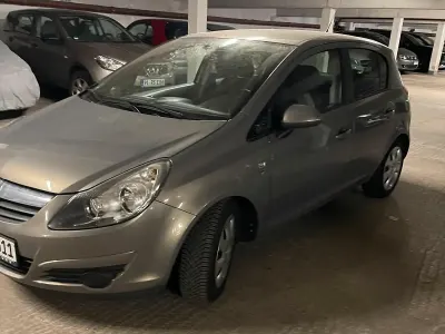 Używany Opel Corsa 90 KM (66 kW) 2010 Szary Hatchback