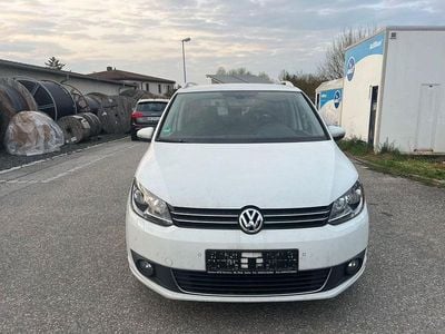 Second-hand VW Touran Cup 105 CP (77 kW) 2014 Alb Monovolum