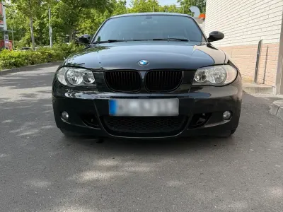 Usata BMW 116 122 CV (89 kW) 2010 Nero Utilitaria