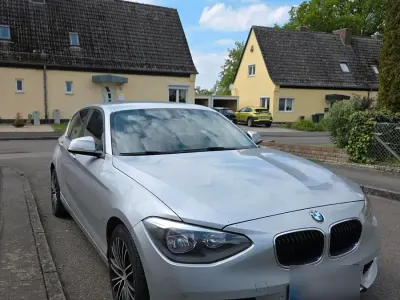 Używany BMW 116 143 KM (105 kW) 2011 Srebrny Hatchback