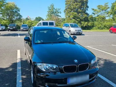 Gebraucht BMW 116 122 PS (89 kW) 2010 Schwarz Kleinwagen