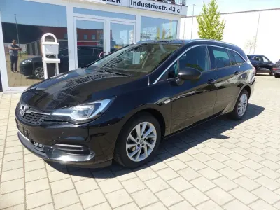 Używany Opel Astra Business Elegance 122 KM (89 kW) 2021 Czarny Kombi