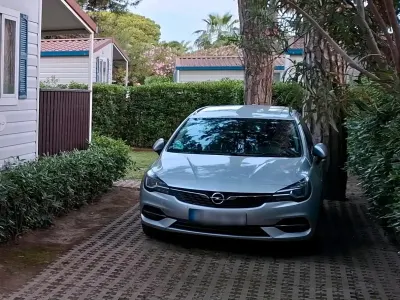 Używany Opel Astra 122 KM (89 kW) 2020 Srebrny Kombi