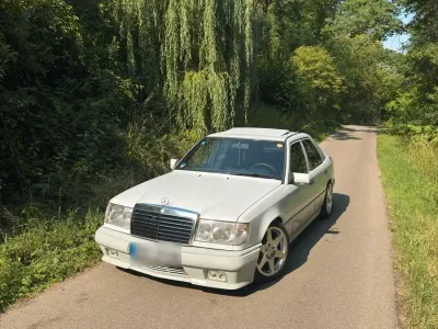 Gebraucht Mercedes 260 AMG 160 PS (117 kW) 1991 Weiß Limousine