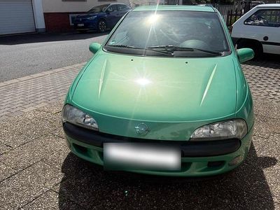 Second-hand Opel Tigra 90 CP (66 kW) 1997 Verde Coupe
