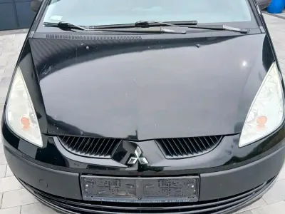 Gebraucht Mitsubishi Space Star 75 PS (55 kW) 2005 Schwarz Kleinwagen