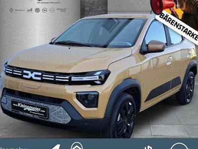 Gebraucht Dacia Spring Extreme 47 kW (65 PS) 2024 Safaribeige Kleinwagen