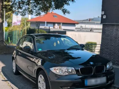 Gebraucht BMW 116 122 PS (89 kW) 2009 Schwarz Kleinwagen