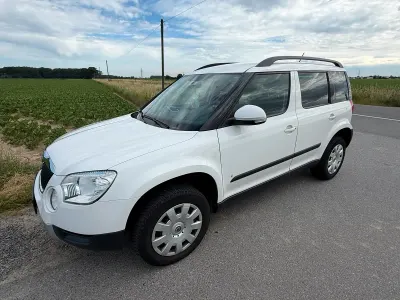 Gebraucht Skoda Yeti Active 105 PS (77 kW) 2011 Weiß SUV