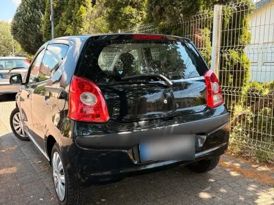 Gebraucht Nissan Pixo 68 PS (50 kW) 2010 Schwarz Kleinwagen