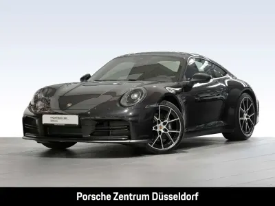 Gebraucht Porsche 911 Carrera 394 PS (289 kW) 2024 Schwarz Coupé