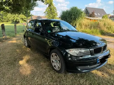 Gebraucht BMW 116 116 PS (85 kW) 2010 Schwarz Kleinwagen