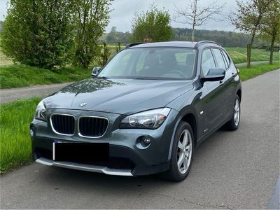 gebraucht BMW X1 grün mit AHK