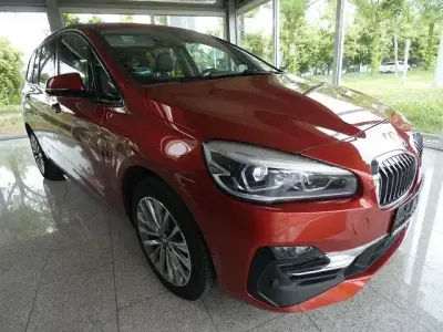 Gebraucht BMW 220 Gran Tourer Luxury Line 192 PS (141 kW) 2020 Orange Van / Kleinbus