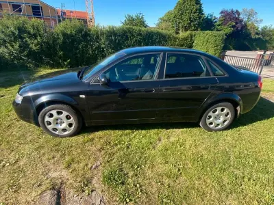 Używany Audi A4 102 KM (75 kW) 2003 Czarny Sedan/Limuzyna