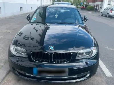 Gebraucht BMW 116 122 PS (89 kW) 2010 Schwarz Kleinwagen
