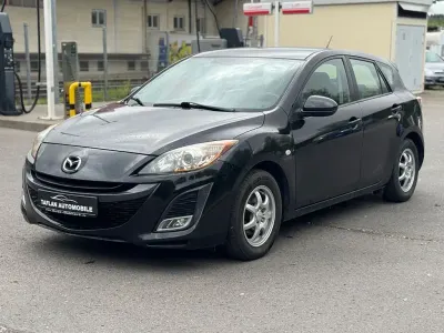 Używany Mazda 3 Edition 105 KM (77 kW) 2011 Czarny Sedan/Limuzyna