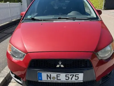 Begagnad Mitsubishi Colt Inform 95 HK (69 kW) 2009 Röd Halvkombi